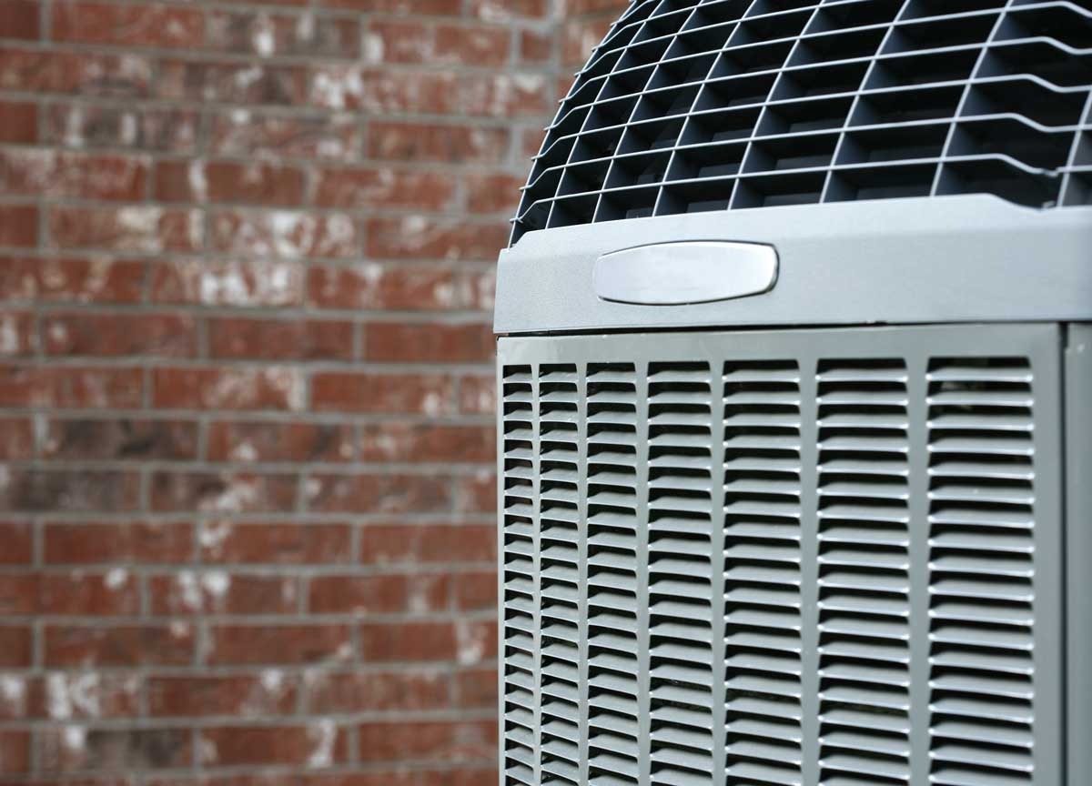 Hvac,services, ,technician,installing,air,conditioner,on,the,wall