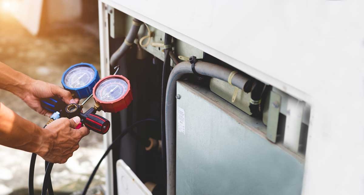 Hvac,services, ,technician,installing,air,conditioner,on,the,wall
